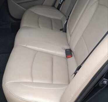 Черный Киа Оптима, объемом двигателя 2.36 л и пробегом 225 тыс. км за 8800 $, фото 4 на Automoto.ua