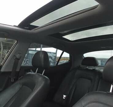 Черный Киа Оптима, объемом двигателя 2.36 л и пробегом 136 тыс. км за 10400 $, фото 22 на Automoto.ua