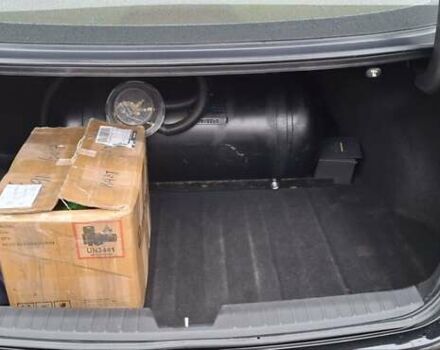 Черный Киа Оптима, объемом двигателя 2.36 л и пробегом 225 тыс. км за 8800 $, фото 7 на Automoto.ua