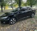 Чорний Кіа Оптіма, об'ємом двигуна 2.4 л та пробігом 217 тис. км за 8800 $, фото 1 на Automoto.ua