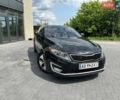 Чорний Кіа Оптіма, об'ємом двигуна 2.36 л та пробігом 273 тис. км за 9100 $, фото 1 на Automoto.ua