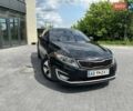 Черный Киа Оптима, объемом двигателя 2.36 л и пробегом 273 тыс. км за 10000 $, фото 1 на Automoto.ua