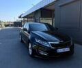 Чорний Кіа Оптіма, об'ємом двигуна 2 л та пробігом 397 тис. км за 7700 $, фото 1 на Automoto.ua