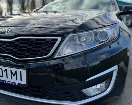 Черный Киа Оптима, объемом двигателя 2.36 л и пробегом 210 тыс. км за 10500 $, фото 6 на Automoto.ua