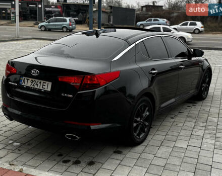 Чорний Кіа Оптіма, об'ємом двигуна 2.36 л та пробігом 206 тис. км за 6850 $, фото 24 на Automoto.ua