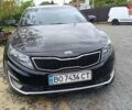Черный Киа Оптима, объемом двигателя 2.36 л и пробегом 250 тыс. км за 6000 $, фото 1 на Automoto.ua