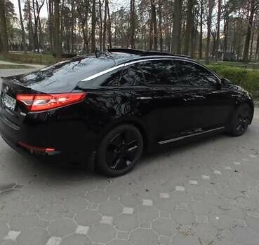 Черный Киа Оптима, объемом двигателя 2.36 л и пробегом 136 тыс. км за 10400 $, фото 7 на Automoto.ua