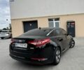 Чорний Кіа Оптіма, об'ємом двигуна 0 л та пробігом 180 тис. км за 7496 $, фото 1 на Automoto.ua