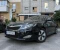 Чорний Кіа Оптіма, об'ємом двигуна 2.4 л та пробігом 265 тис. км за 9401 $, фото 1 на Automoto.ua