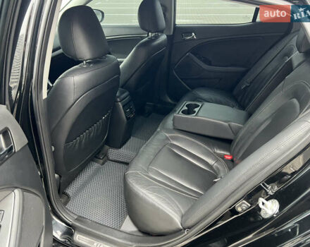 Черный Киа Оптима, объемом двигателя 2 л и пробегом 185 тыс. км за 10200 $, фото 15 на Automoto.ua