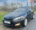 Черный Киа Оптима, объемом двигателя 2.36 л и пробегом 114 тыс. км за 7500 $, фото 1 на Automoto.ua