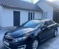 Черный Киа Оптима, объемом двигателя 2.4 л и пробегом 293 тыс. км за 6250 $, фото 1 на Automoto.ua