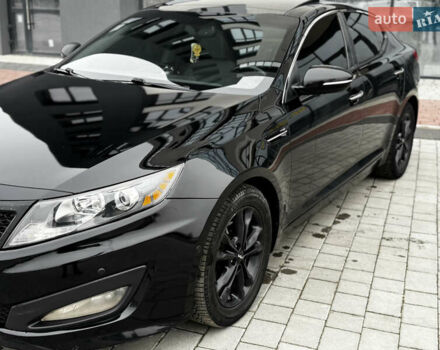 Чорний Кіа Оптіма, об'ємом двигуна 2.36 л та пробігом 206 тис. км за 6850 $, фото 11 на Automoto.ua