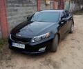 Черный Киа Оптима, объемом двигателя 2.4 л и пробегом 130 тыс. км за 9000 $, фото 1 на Automoto.ua