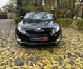 Черный Киа Оптима, объемом двигателя 2.4 л и пробегом 215 тыс. км за 9940 $, фото 1 на Automoto.ua