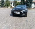 Черный Киа Оптима, объемом двигателя 2.4 л и пробегом 150 тыс. км за 6900 $, фото 1 на Automoto.ua