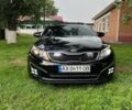 Чорний Кіа Оптіма, об'ємом двигуна 2 л та пробігом 171 тис. км за 11700 $, фото 1 на Automoto.ua