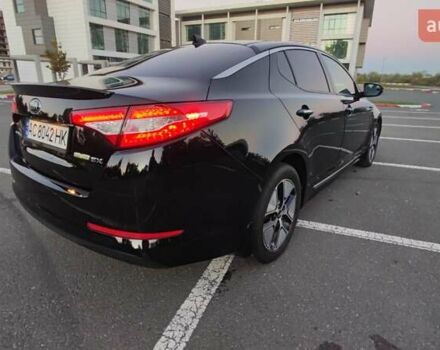 Черный Киа Оптима, объемом двигателя 2.36 л и пробегом 182 тыс. км за 11300 $, фото 1 на Automoto.ua