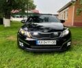 Чорний Кіа Оптіма, об'ємом двигуна 2 л та пробігом 171 тис. км за 12000 $, фото 1 на Automoto.ua
