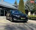 Черный Киа Оптима, объемом двигателя 2.36 л и пробегом 248 тыс. км за 9500 $, фото 1 на Automoto.ua