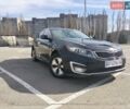 Чорний Кіа Оптіма, об'ємом двигуна 2.36 л та пробігом 235 тис. км за 8500 $, фото 1 на Automoto.ua