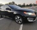 Черный Киа Оптима, объемом двигателя 2.36 л и пробегом 182 тыс. км за 11300 $, фото 5 на Automoto.ua
