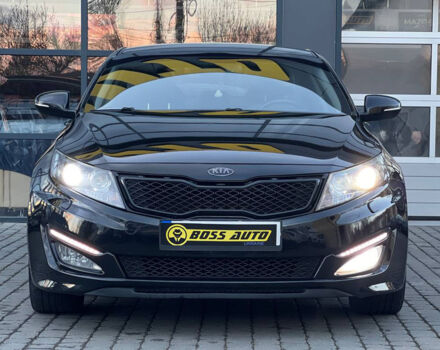 Черный Киа Оптима, объемом двигателя 2.4 л и пробегом 140 тыс. км за 12600 $, фото 1 на Automoto.ua