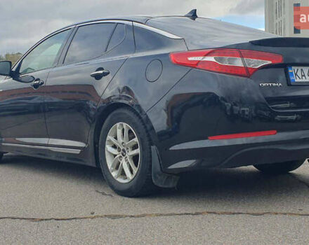 Черный Киа Оптима, объемом двигателя 2.36 л и пробегом 300 тыс. км за 7400 $, фото 3 на Automoto.ua