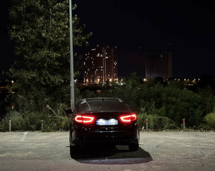 Чорний Кіа Оптіма, об'ємом двигуна 2 л та пробігом 174 тис. км за 12000 $, фото 10 на Automoto.ua