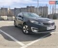 Черный Киа Оптима, объемом двигателя 2.36 л и пробегом 210 тыс. км за 9200 $, фото 1 на Automoto.ua