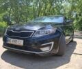 Черный Киа Оптима, объемом двигателя 2.4 л и пробегом 213 тыс. км за 10300 $, фото 1 на Automoto.ua