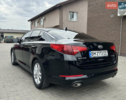 Черный Киа Оптима, объемом двигателя 2.36 л и пробегом 230 тыс. км за 8200 $, фото 2 на Automoto.ua