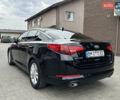 Черный Киа Оптима, объемом двигателя 2.36 л и пробегом 230 тыс. км за 8200 $, фото 2 на Automoto.ua