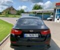 Черный Киа Оптима, объемом двигателя 2 л и пробегом 255 тыс. км за 9300 $, фото 2 на Automoto.ua
