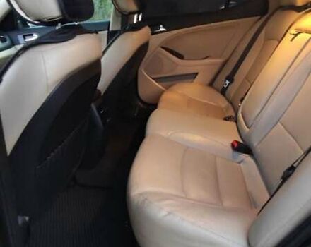 Черный Киа Оптима, объемом двигателя 2.36 л и пробегом 182 тыс. км за 11300 $, фото 4 на Automoto.ua