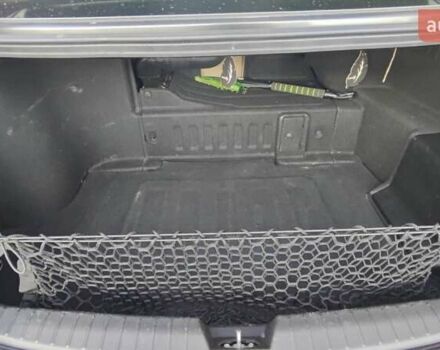 Черный Киа Оптима, объемом двигателя 2.36 л и пробегом 182 тыс. км за 11300 $, фото 8 на Automoto.ua