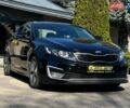 Чорний Кіа Оптіма, об'ємом двигуна 2.36 л та пробігом 248 тис. км за 9500 $, фото 1 на Automoto.ua
