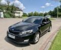 Чорний Кіа Оптіма, об'ємом двигуна 2 л та пробігом 255 тис. км за 10000 $, фото 1 на Automoto.ua