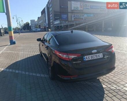 Чорний Кіа Оптіма, об'ємом двигуна 2.36 л та пробігом 409 тис. км за 7200 $, фото 3 на Automoto.ua