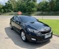 Черный Киа Оптима, объемом двигателя 2 л и пробегом 255 тыс. км за 9300 $, фото 1 на Automoto.ua
