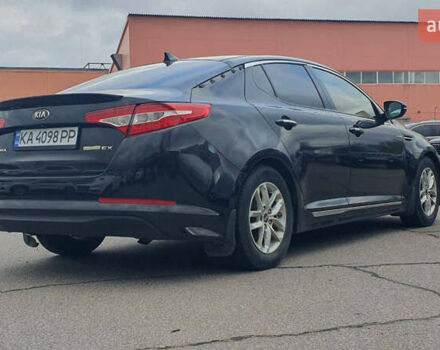 Черный Киа Оптима, объемом двигателя 2.36 л и пробегом 300 тыс. км за 7400 $, фото 1 на Automoto.ua