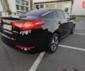 Черный Киа Оптима, объемом двигателя 2.36 л и пробегом 182 тыс. км за 11000 $, фото 1 на Automoto.ua