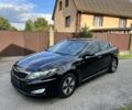 Чорний Кіа Оптіма, об'ємом двигуна 2.4 л та пробігом 250 тис. км за 8999 $, фото 1 на Automoto.ua