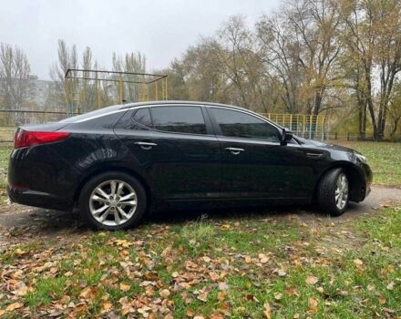 Черный Киа Оптима, объемом двигателя 2.4 л и пробегом 240 тыс. км за 9500 $, фото 1 на Automoto.ua
