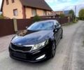 Черный Киа Оптима, объемом двигателя 2.4 л и пробегом 252 тыс. км за 10000 $, фото 2 на Automoto.ua