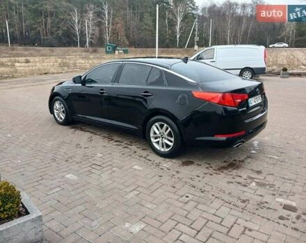 Черный Киа Оптима, объемом двигателя 2.36 л и пробегом 194 тыс. км за 8800 $, фото 1 на Automoto.ua