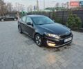 Черный Киа Оптима, объемом двигателя 2.36 л и пробегом 251 тыс. км за 9750 $, фото 1 на Automoto.ua