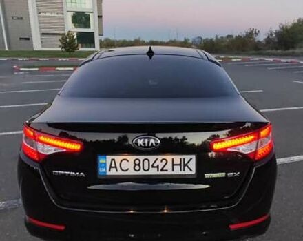 Черный Киа Оптима, объемом двигателя 2.36 л и пробегом 182 тыс. км за 11300 $, фото 3 на Automoto.ua