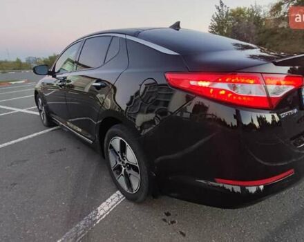 Черный Киа Оптима, объемом двигателя 2.36 л и пробегом 182 тыс. км за 11300 $, фото 6 на Automoto.ua