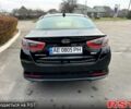 Черный Киа Оптима, объемом двигателя 24 л и пробегом 156 тыс. км за 10700 $, фото 4 на Automoto.ua